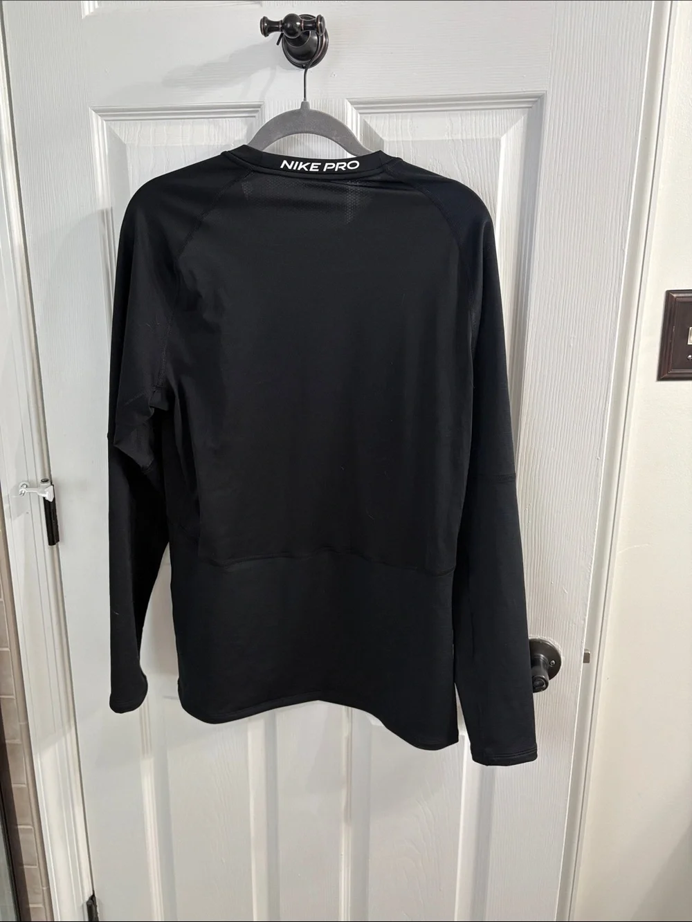 Nike Black Long Sleeve Performance Shirt with White Swoosh